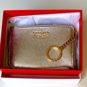 Kate spade medium l zip wallet/key chain.  NWT